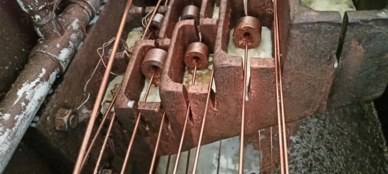 Copper wire passing through Elite Cables drawing equipment